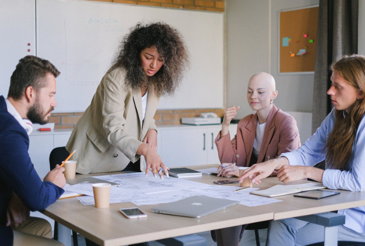 Diverse Team Collaboration in Modern Workplace.